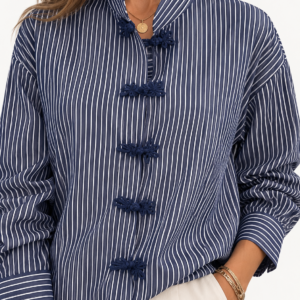 CAMISA RAYAS CON APLICACIONES
